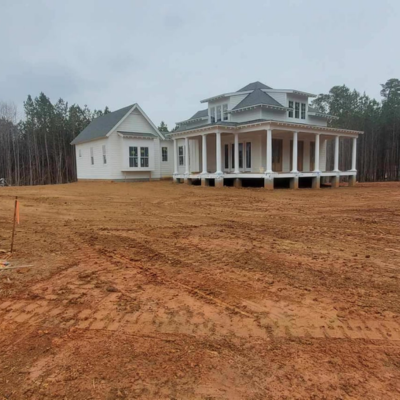 Professional land clearing crew working on a large property in Charlotte, NC.
