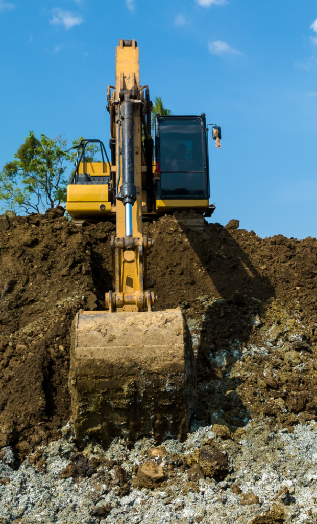 Large excavator used for land excavation in Charlotte, NC.